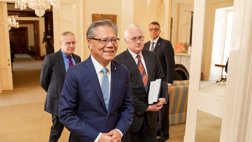SA Governor Hieu Van Le in the foreground followed by royal commissioner Bret Walker at Government House.