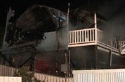 A double storey house destroyed by blaze at Golden Bay