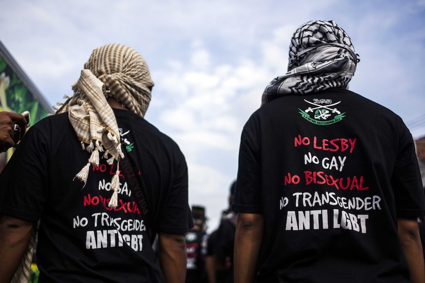 Anti-LGBT Muslim group marching to blockade pro-LGBT protesters in Yogyakarta, in Java island.