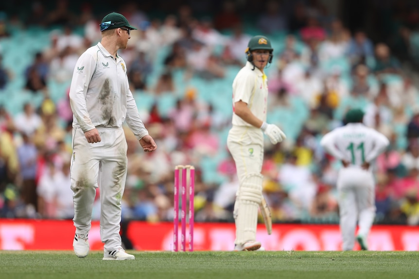 Marnus Labuschagne looks at Simon Harmer