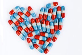 Pills in shape of heart (Thinkstock: Photos.com)