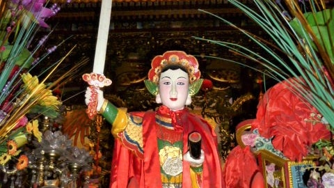 A Mother Chen temple statue portrays the deity as a martial god.