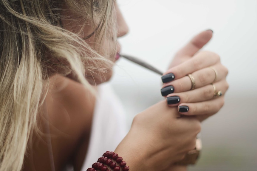 Woman smoking cannabis