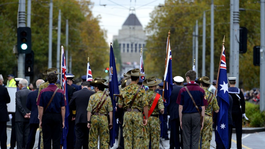 The Anzac Day parade makes its way through Melbourne's CBD