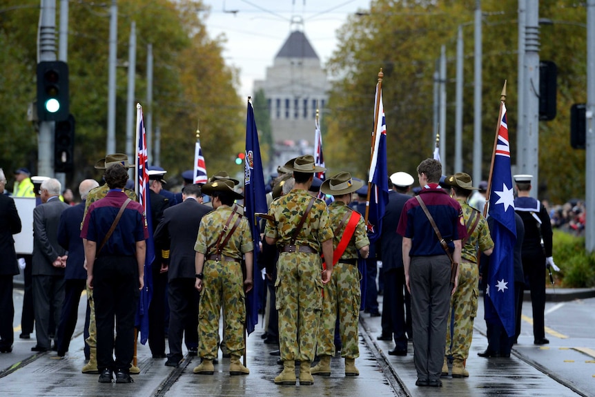 An Anzac Day parade makes its way through Melbourne's CBD to the Shrine of Remembrance.
