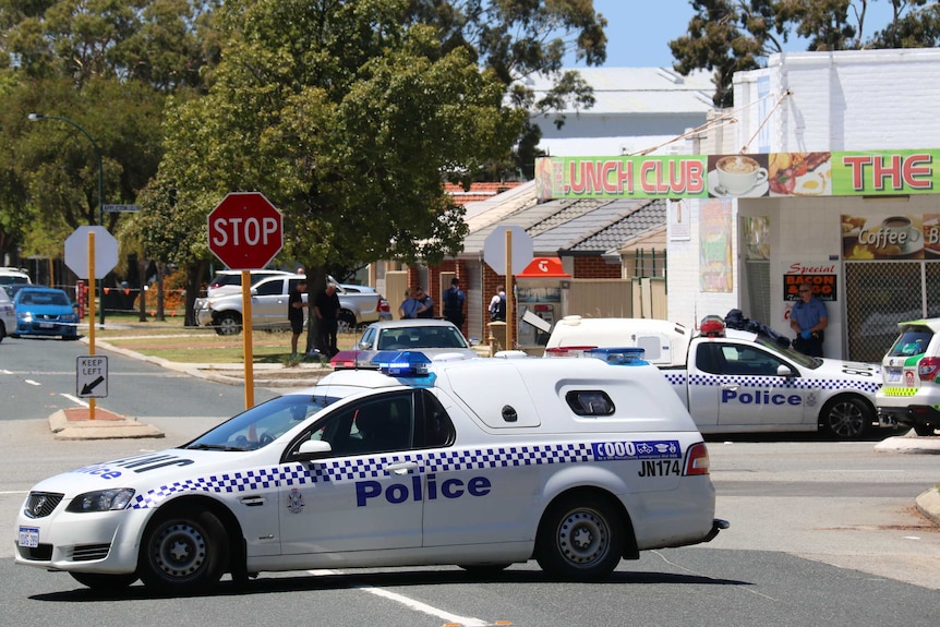 Police investigate the scene of a police shooting in Carlisle on Saturday morning.