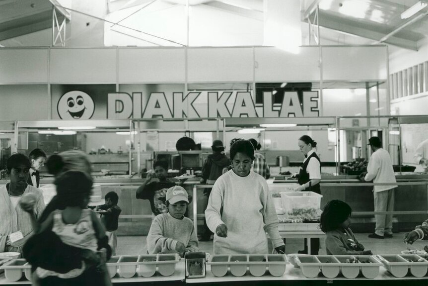 The dining hall at Puckapunyal in 1999, featured a large sign in Tetum, which read "Diak Kalae" - how are you, in English.