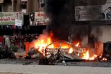 Scene of car bombing in Baghdad suburb