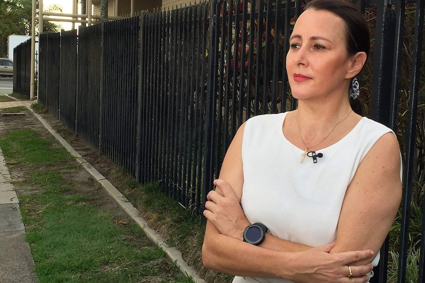 Domestic violence survivor Michelle Beattie stands outside the ABC Radio Gold Coast studio.