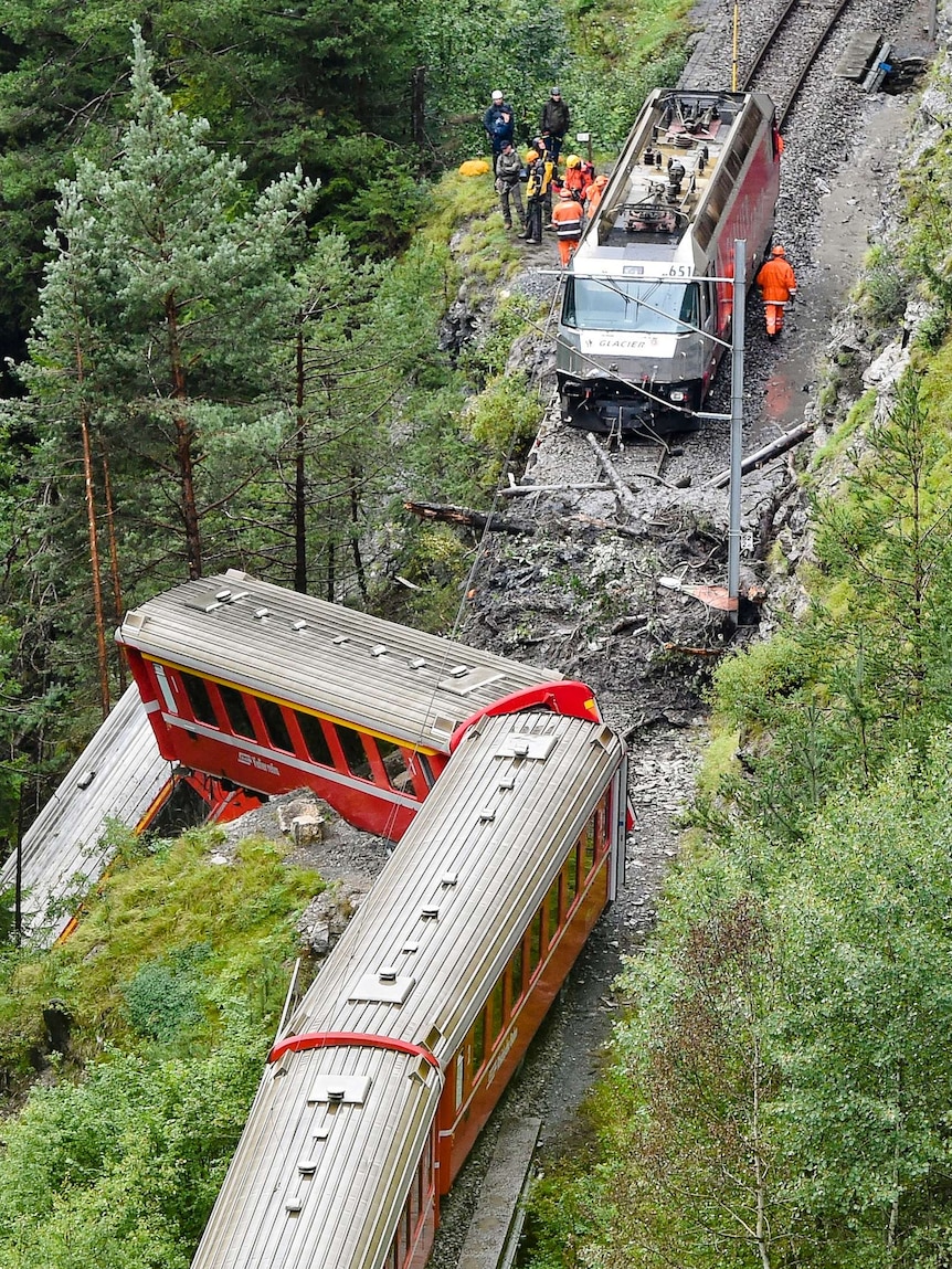 Swiss train derails after mudslide