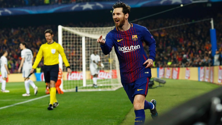 Lionel Messi celebrates Barcelona's first goal against Chelsea
