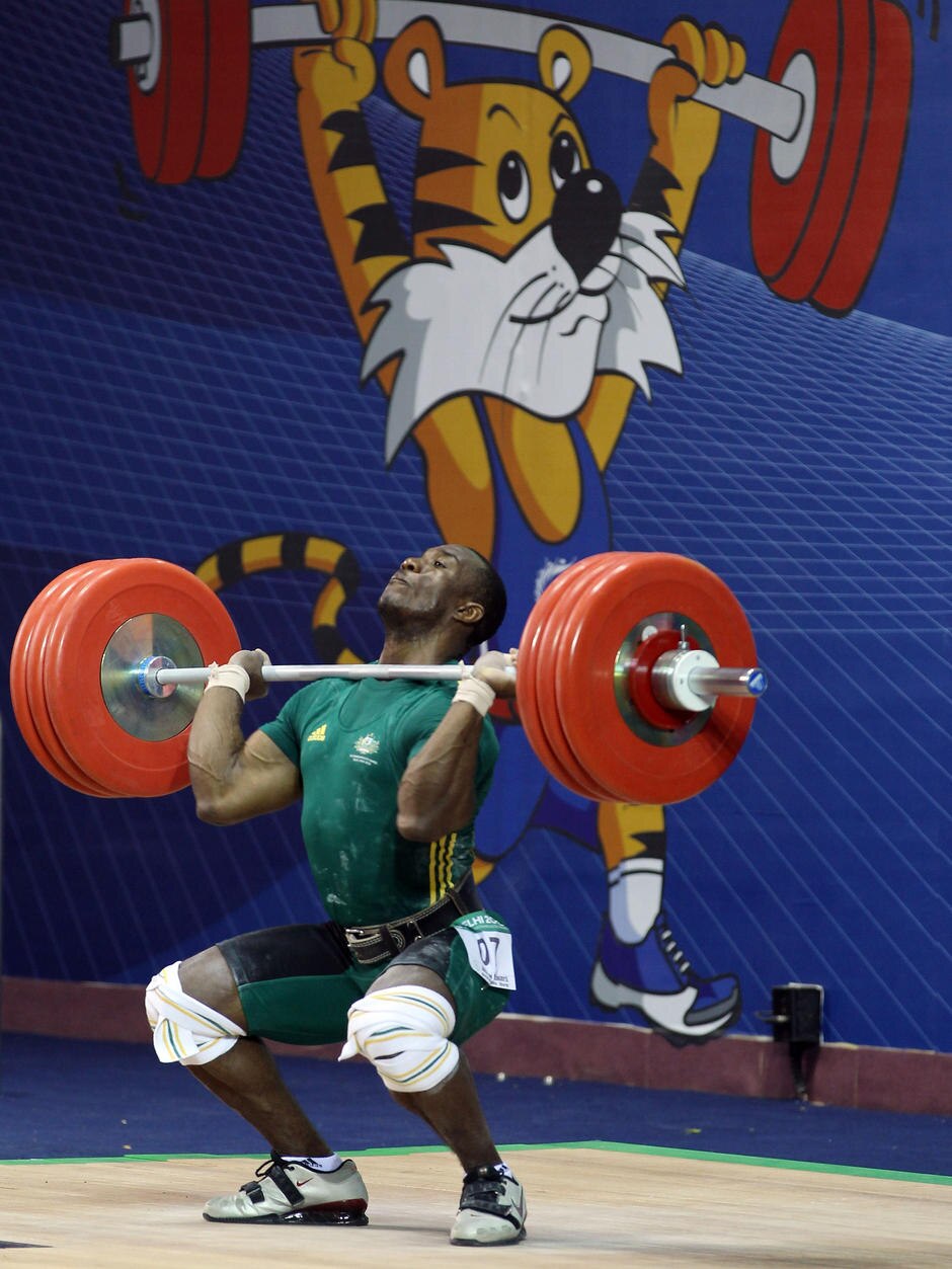 Ribouem wins weightlifting gold - ABC News
