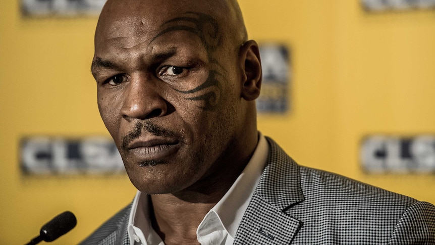 US boxer and former heavyweight world champion Mike Tyson speaks to a press conference in Hong Kong.