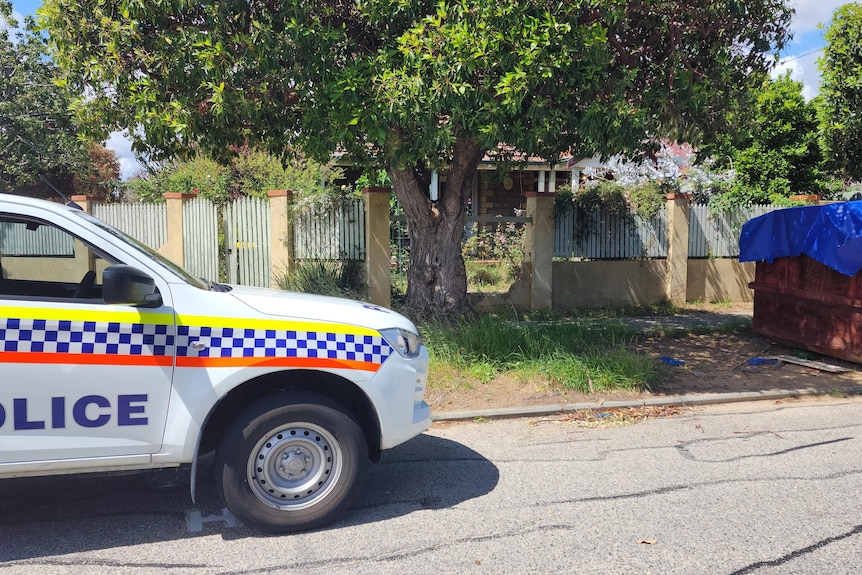 A police car parked on a street in Woodbridge.