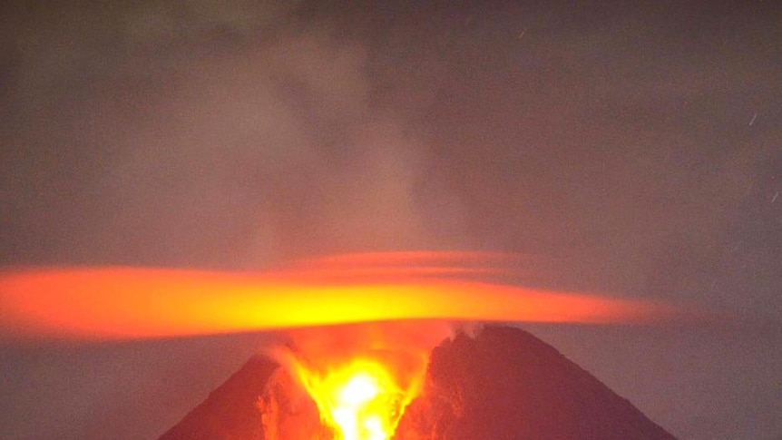 Molten lava flows from the crater of Indonesia's Mount Merapi