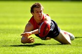 Getting to work: Melbourne draftee Jack Trengove kept himself busy with 23 touches, three tackles and a goal.