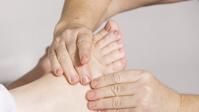 picture of hands massaging a foot