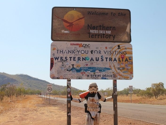 Stormtrooper charity walker Scott Loxley at the NT-WA border during his around Australia trek.