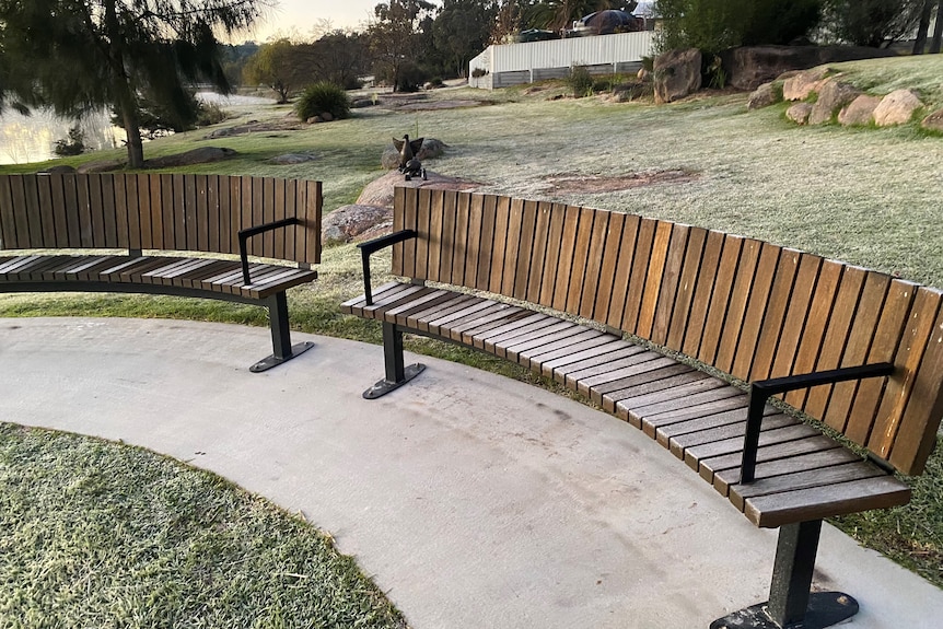 Frost on seats and across park in Stanthorpe