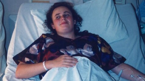 Rebel Wilson, as a teenager, in a hospital bed.