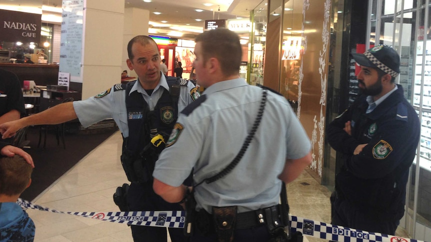 Police at Parramatta's Westfield shopping centre after a fatal stabbing.