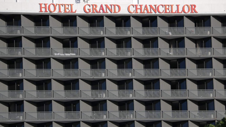 Close-up shots of balconies and sign of Brisbane's Hotel Chancellor in Brisbane.