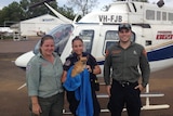 Dog rescued from flooding at Daly River.