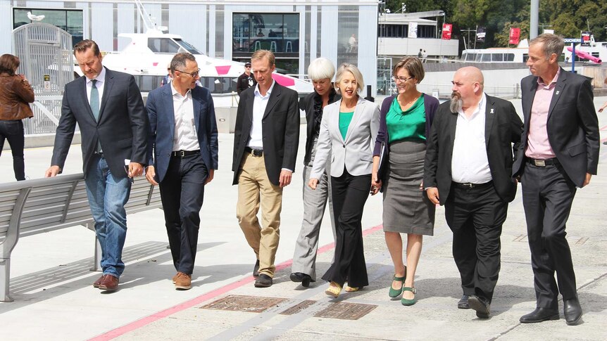 Political candidates walking together.