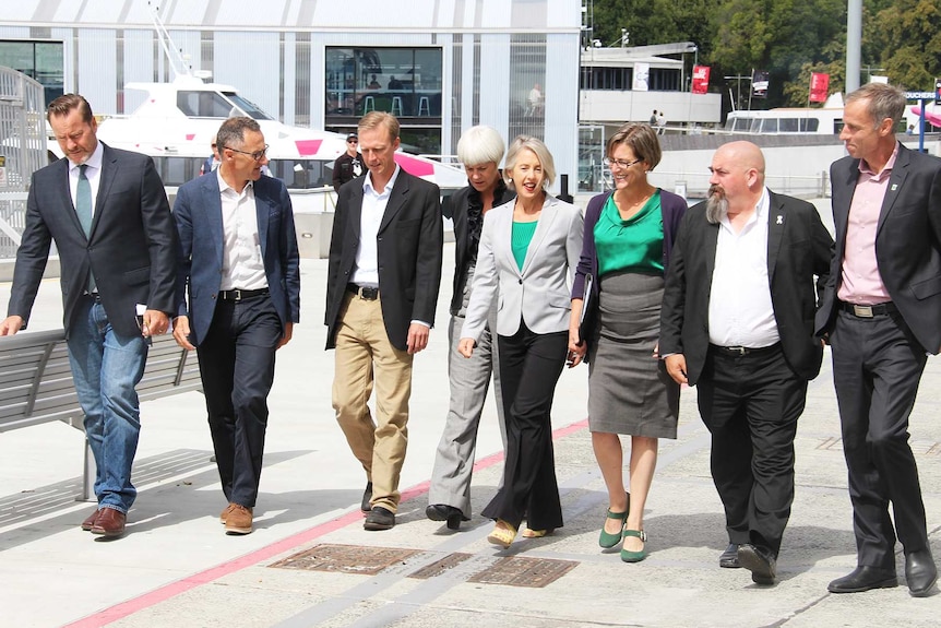 Political candidates walking together.