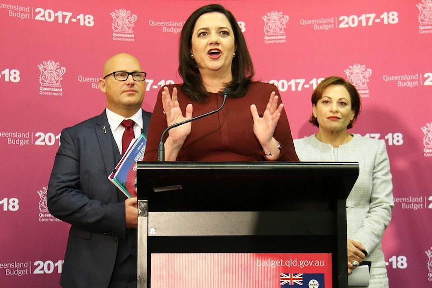 Premier Annastacia Palaszczuk, with Treasurer Curtis Pitt and Deputy Premier Jackie Pitt at Qld budget lockup