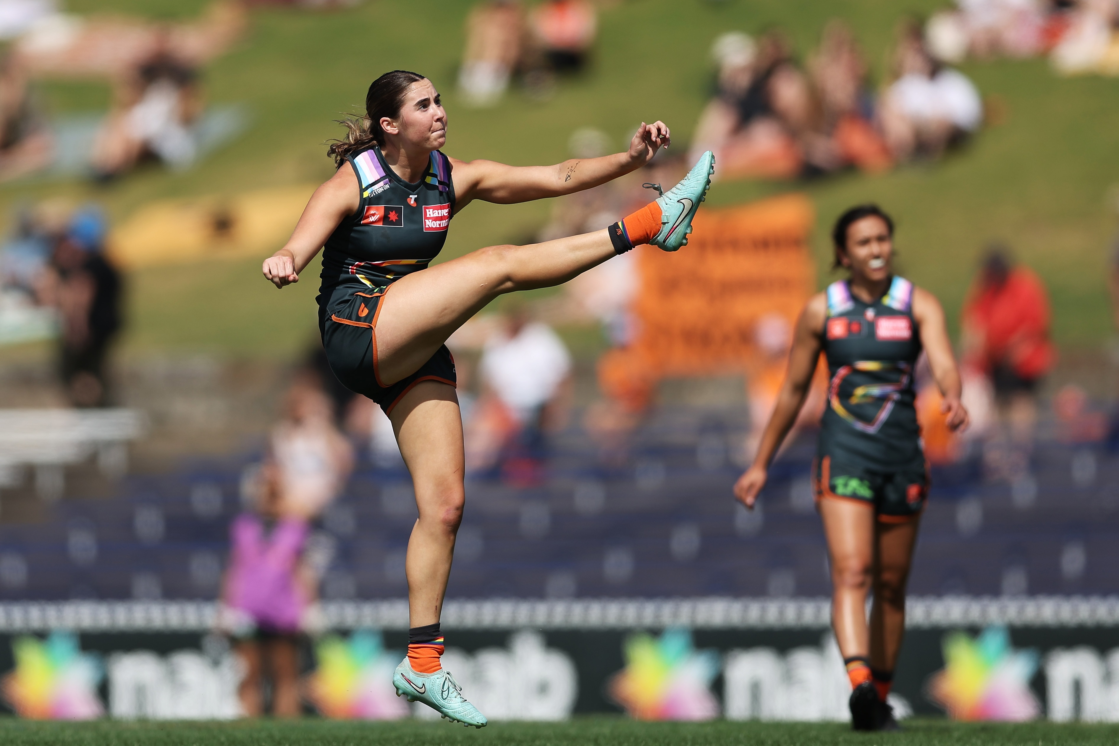 Zarlie Goldsworthy of the Giants kicks during a game.