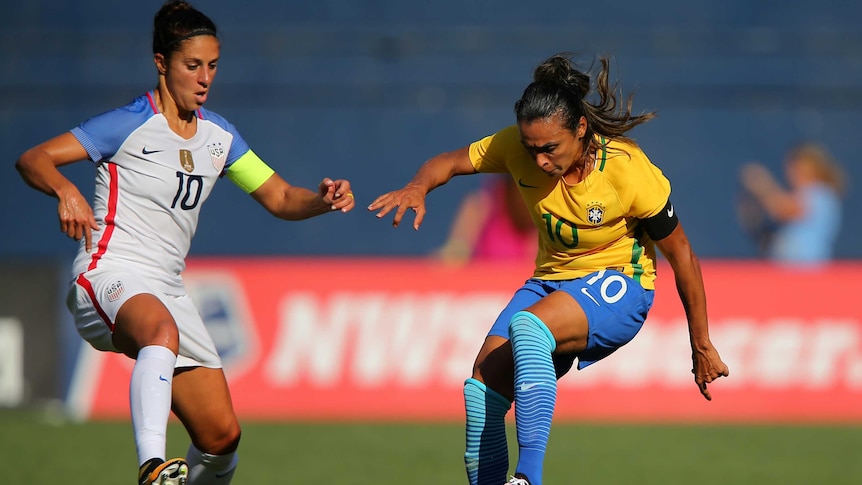 Brazil's Marta shows skill against USA's Carli Lloyd