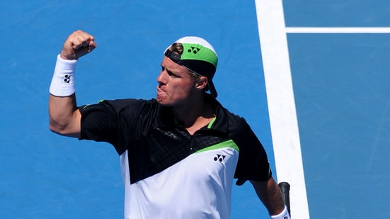 Lleyton Hewitt pumps his fist during a match.