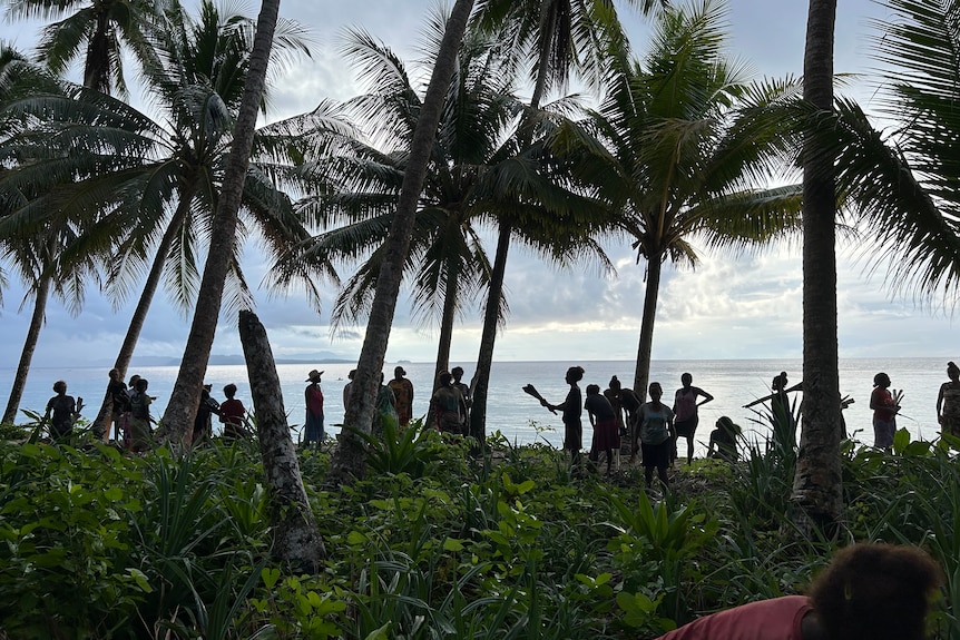 People walkign on an island