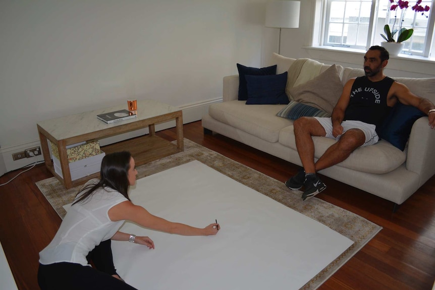 Artist Megan Adams sketches Adam Goodes for an Archibald Prize entry portrait.