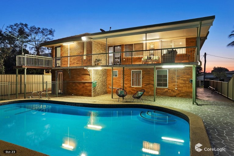A home in Wandal, rockhampton, with a pool. 