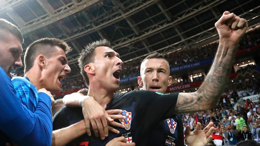 Mario Mandzukic celebrates his winner against England