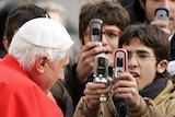 Pope Benedict XVI greets pilgrims