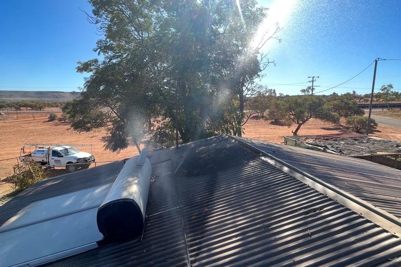 roof on house with panels looking at desert landscape