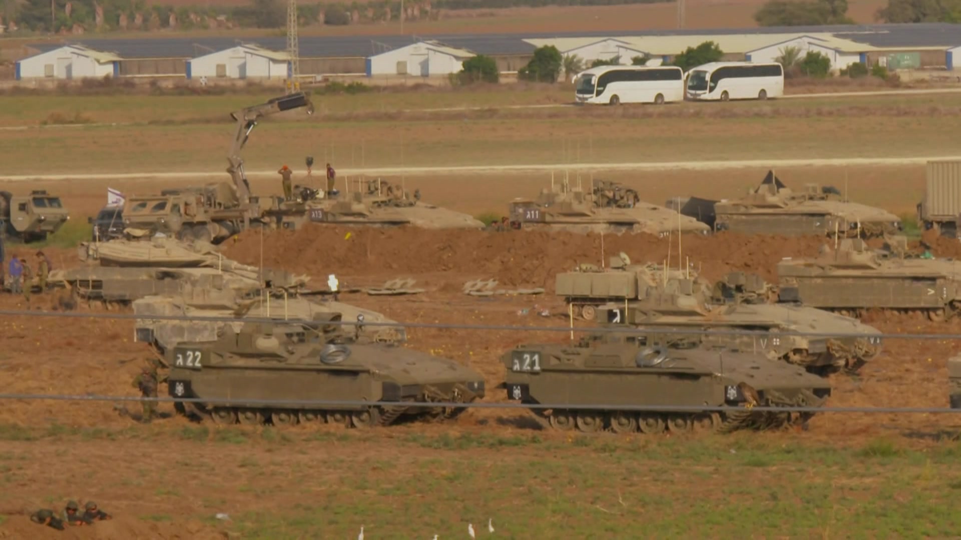 Army tanks in a field