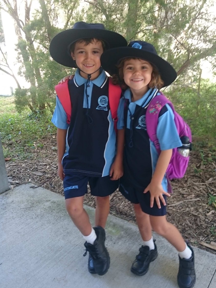 Siblings Sophie Mergler and Ben Monteith smile for the camera