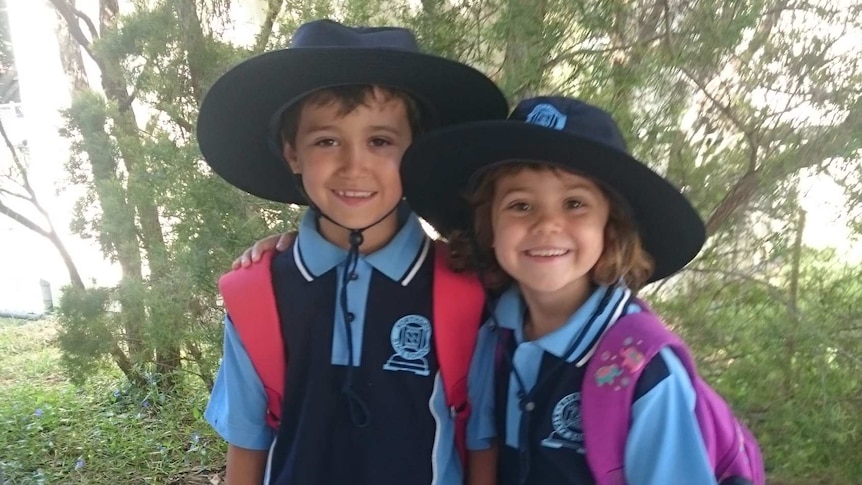 Siblings Sophie Mergler and Ben Monteith smile for the camera