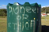 'Pioneer or Ethiopia' graffitied on a water tank