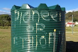 'Pioneer or Ethiopia' graffitied on a water tank