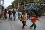 Thousands more flee as Philippines stand-off continues