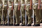 Australian soldiers stand to attention