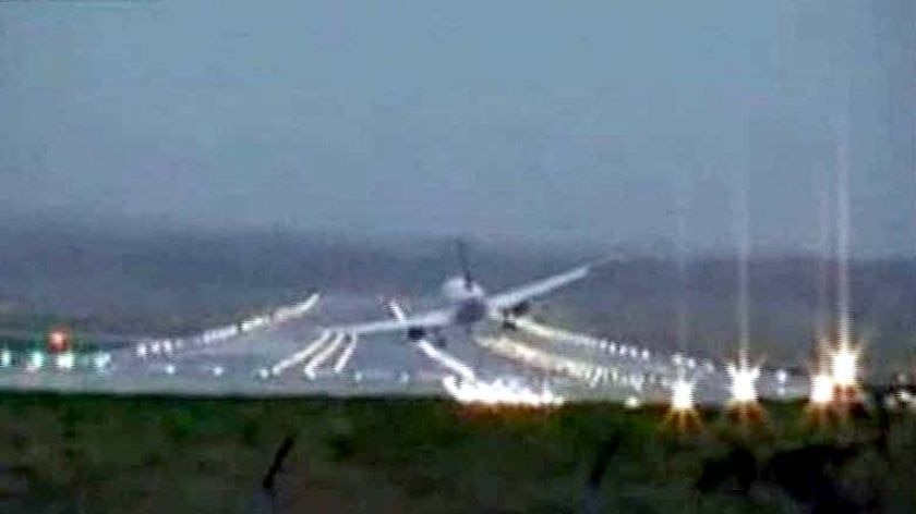 The wing of a Lufthansa jet scrapes the runway