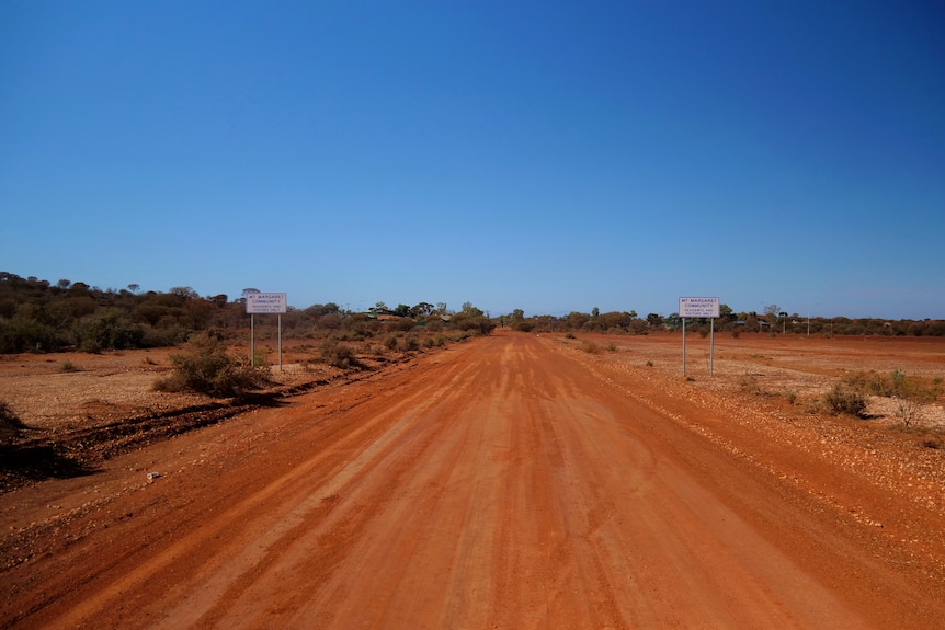 A stretch of red dirt road.