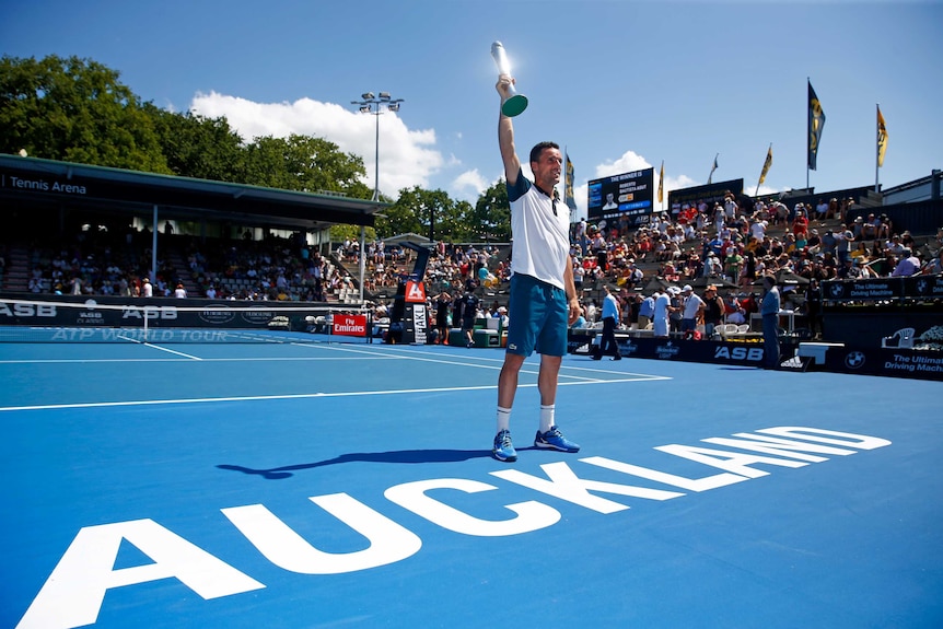 Roberto Bautista Agut raises the Auckland tennis classic trophy