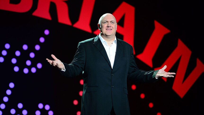 Dara O'Briain on stage during a stand up comedy set